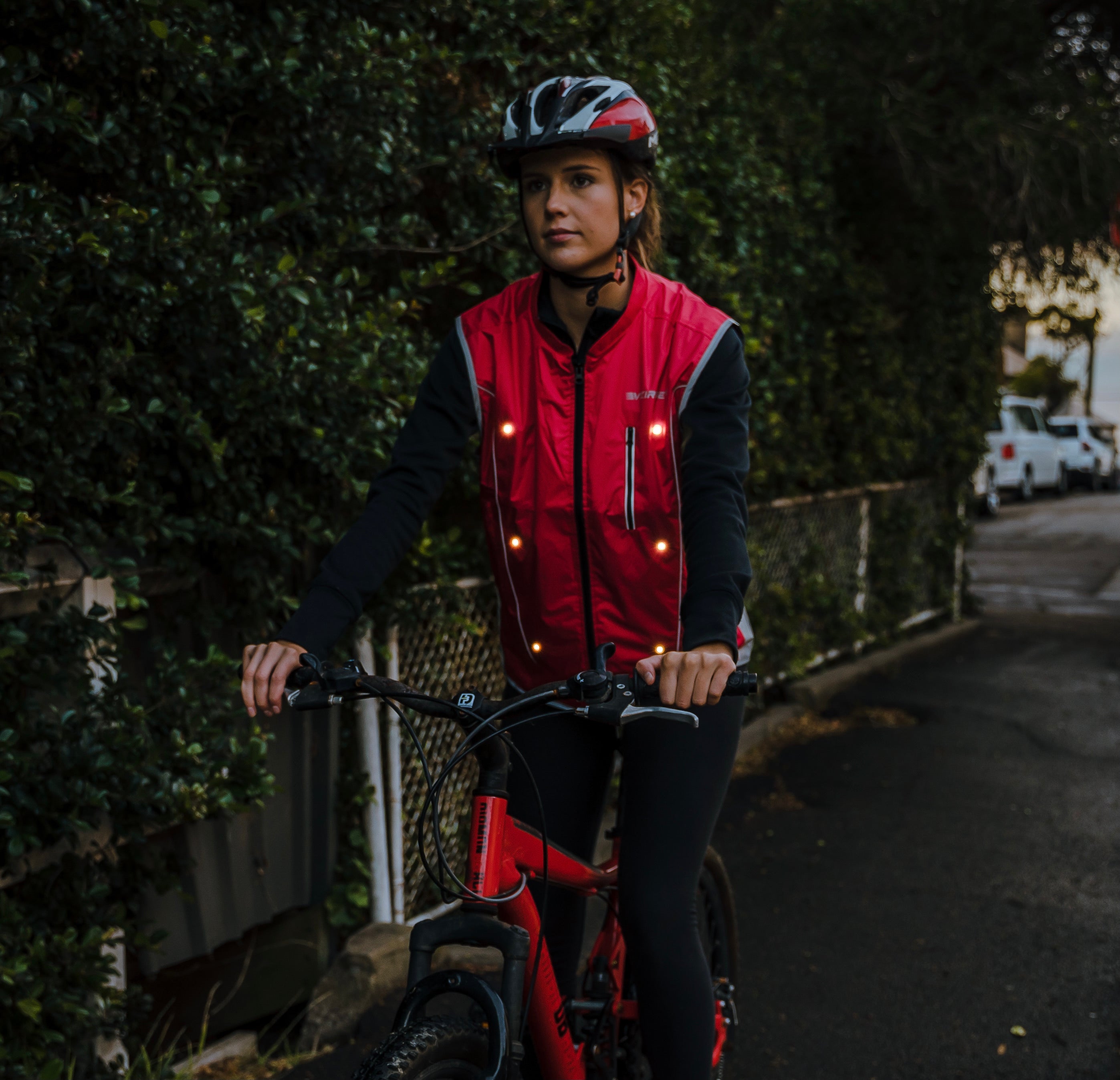 red gilet with LED lights